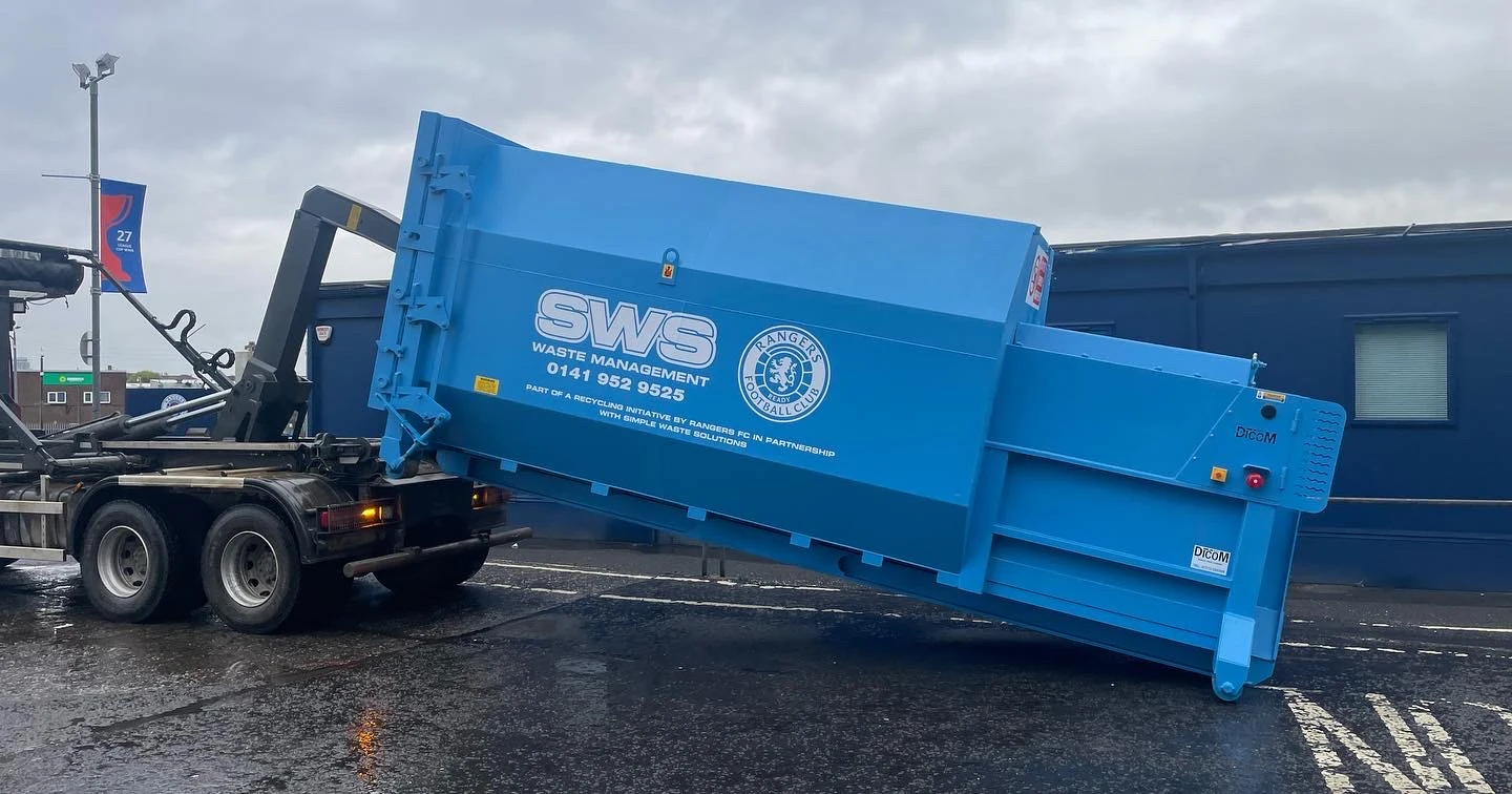 New SWS commercial compactor delivered to site on a trailer